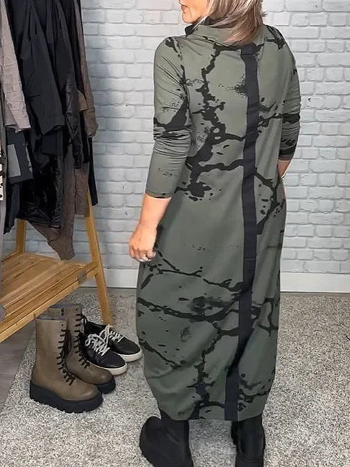 Khaki Livienne dames jurk met lange mouwen, elegante vintage stijl en opvallend retro patroon.