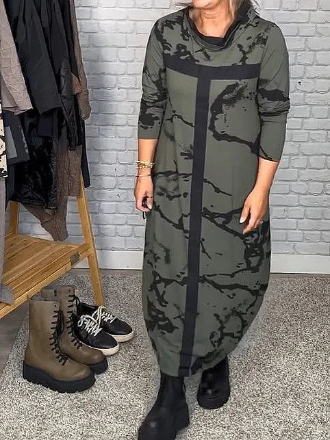 Stijlvolle dames jurk met lange mouwen en retro patroon; een comfortabele en veelzijdige keuze voor elke vrouw.
