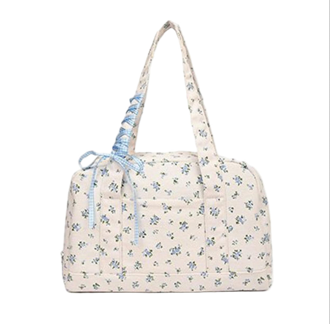 Ideale Floria vakantietas: ruime canvas damestas met strik, perfect voor weekendjes weg of korte reizen.