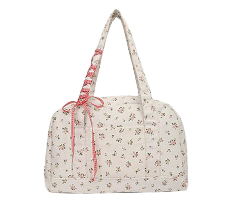 Stijlvolle dames weekendtas Floria met strik, ruime canvas reistas voor een modieuze vrouw.