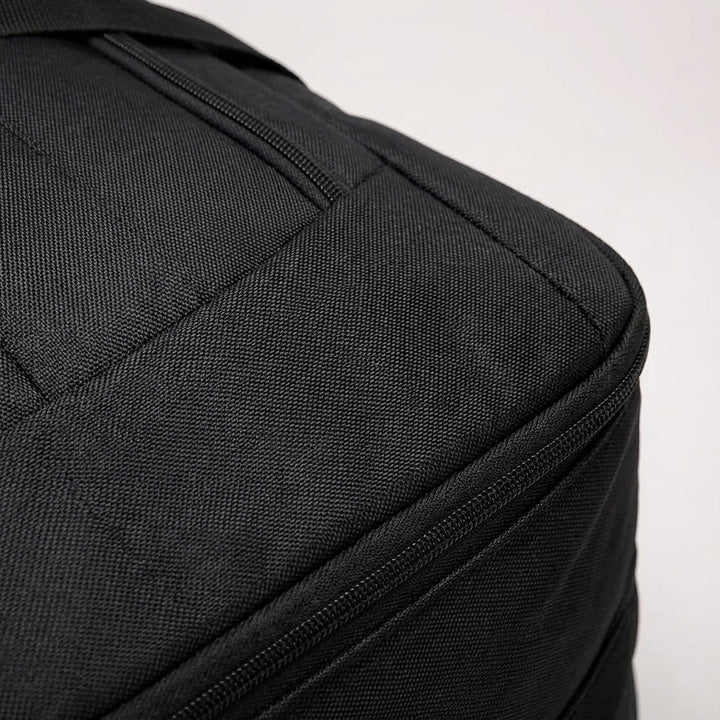 Unisex opvouwbare trolley met uitschuifbaar handvat en stevige wielen, moeiteloos te trekken als reisaccessoire.