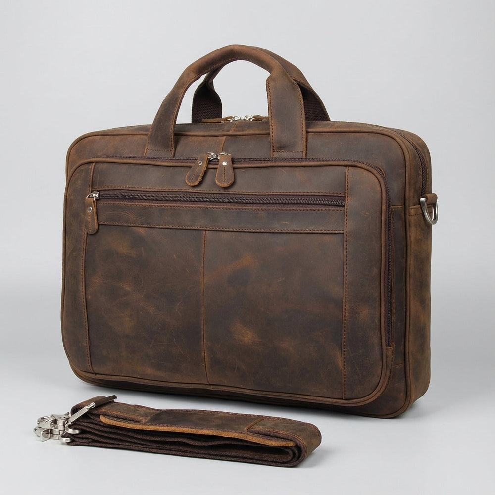 Bruine vintage leren laptoptas, professionele schoudertas en reistas voor zakelijk gebruik.