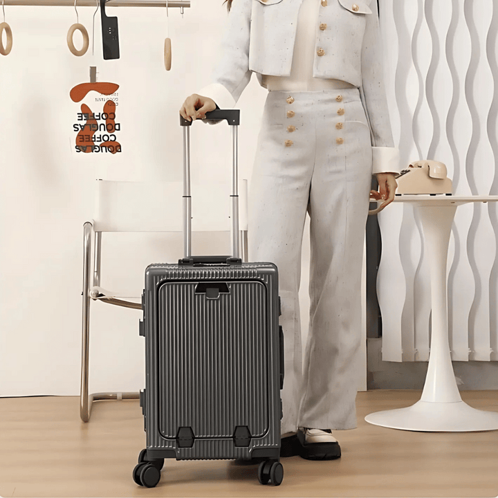 Zwarte Manhattan Pro smart koffer, stevig en ritsloos, ideaal voor zakelijk reizen.