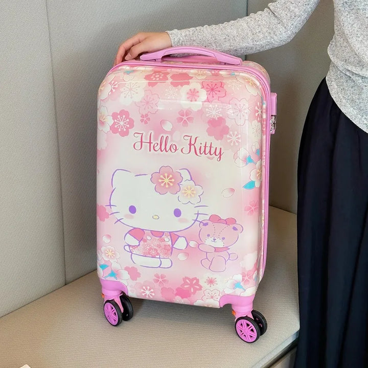 Compacte, lichtgewicht kinderkoffer met Hello Kitty & Kuromi design en organizer voor reisgemak.