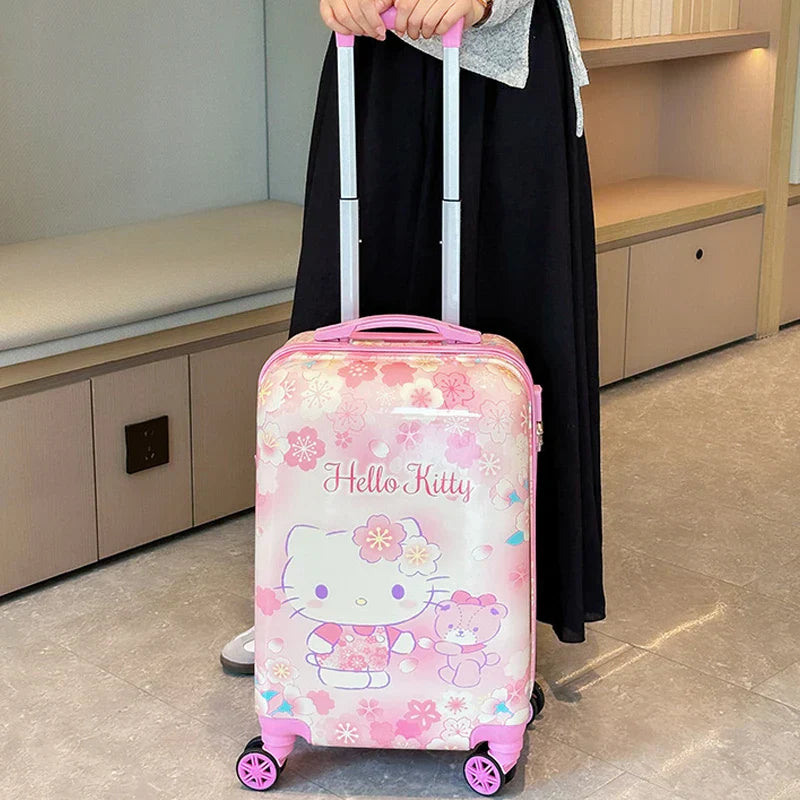 Vrolijke Hello Kitty & Kuromi kinderkoffer, harde schaal, perfect als handbagage en reiskoffer.