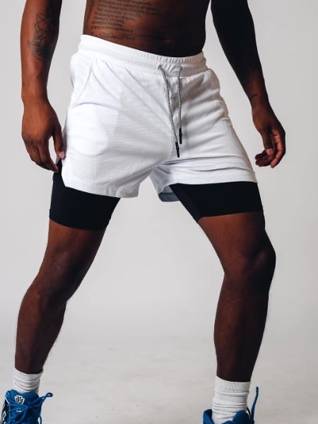 Stijlvolle camouflage heren 2-in-1 activewear short, ademend en comfortabel voor sport.