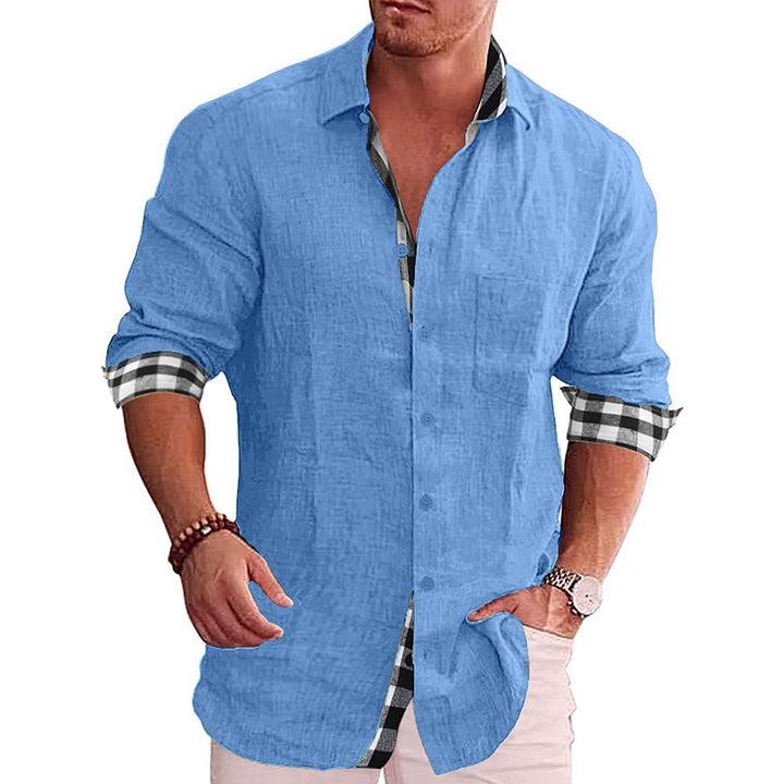 Elegante casual herenoverhemd met lange mouwen en geruite manchetten, combineert stijl en comfort.