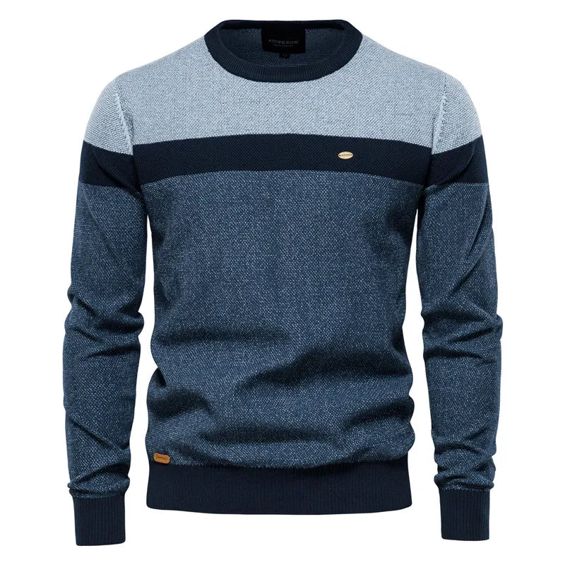 Heren casual trui met ronde hals, stijlvolle kleurblokken en lange mouwen. Ideaal voor najaar en wintermode.