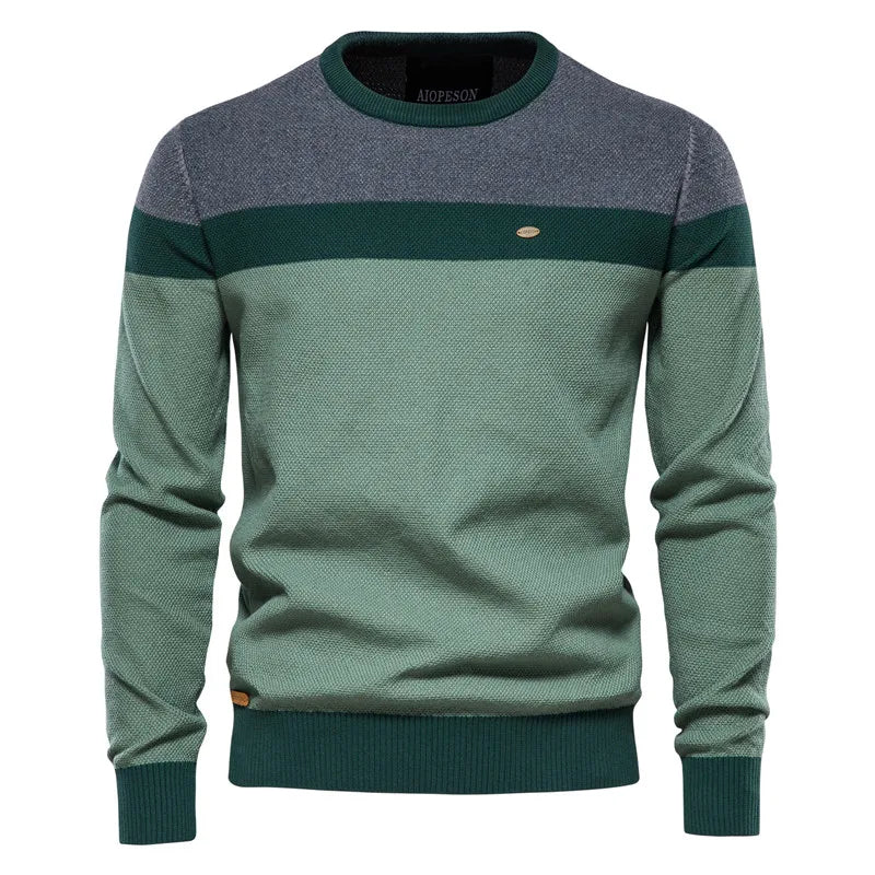 Moderne herentrui met unieke kleurblokken en ronde hals. Een comfortabele lange mouwen trui voor de herfst.