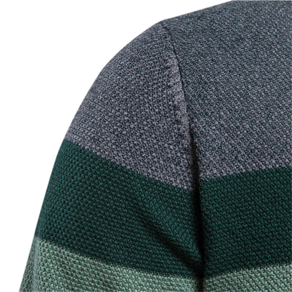 Heren ronde hals trui met trendy kleurblokken design. Slim fit en lange mouwen voor een stijlvolle look.