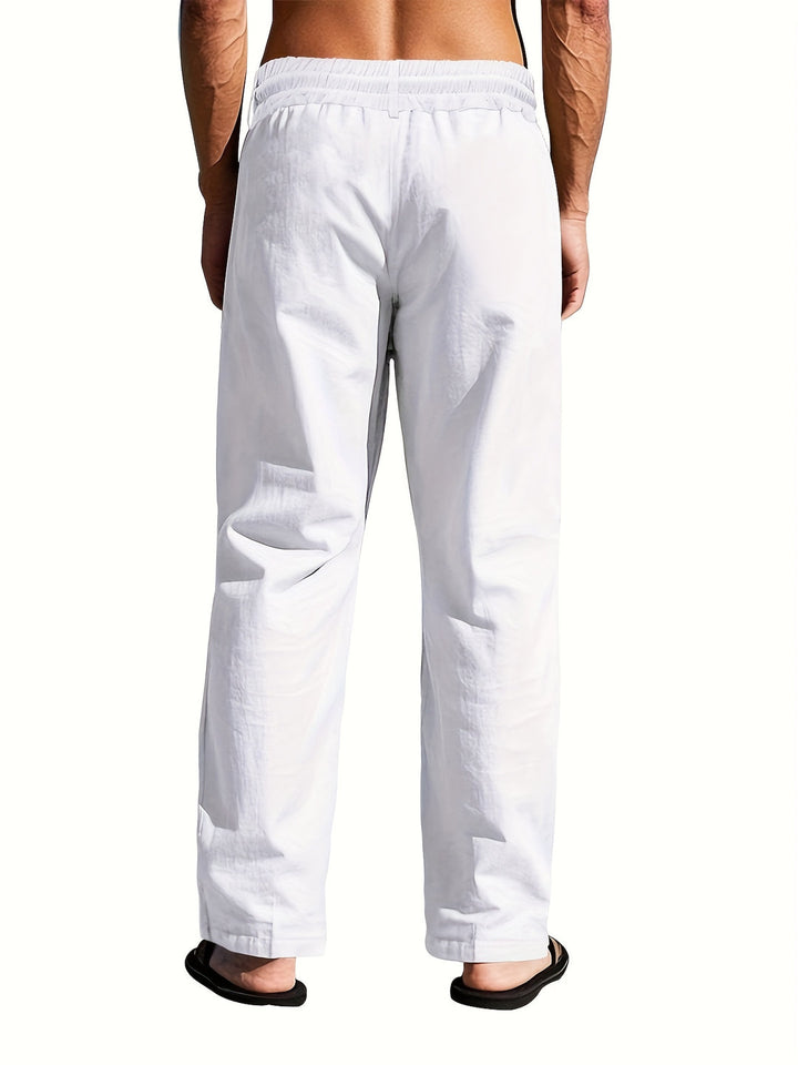 Zachte heren broek met trekkoord, rechte pijpen; een comfortabele en modieuze keuze voor de zomer en vrije tijd.