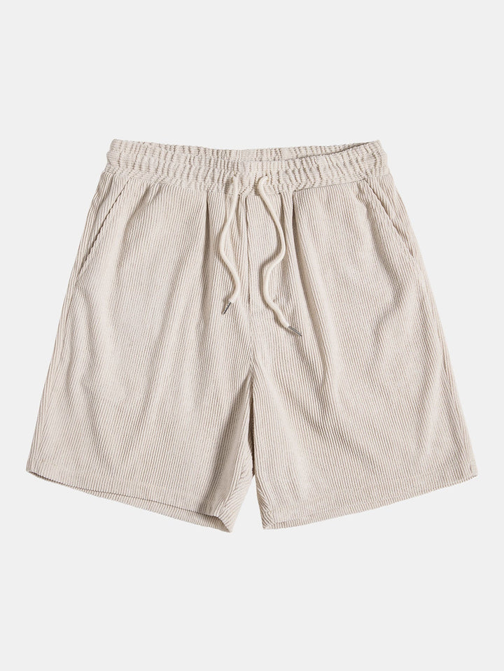 Wijde corduroy broek van de heren kledingset, relaxed fit en comfortabel voor een zomerse casual outfit.