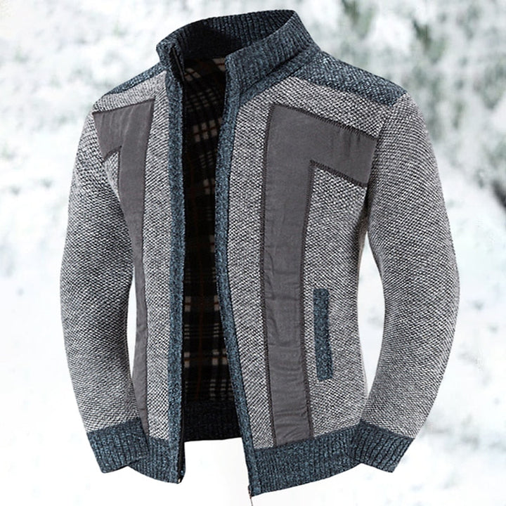 Stijlvol heren ritsvest met opvallend patchwork patroon, perfect voor trendy winterlagen en mode.