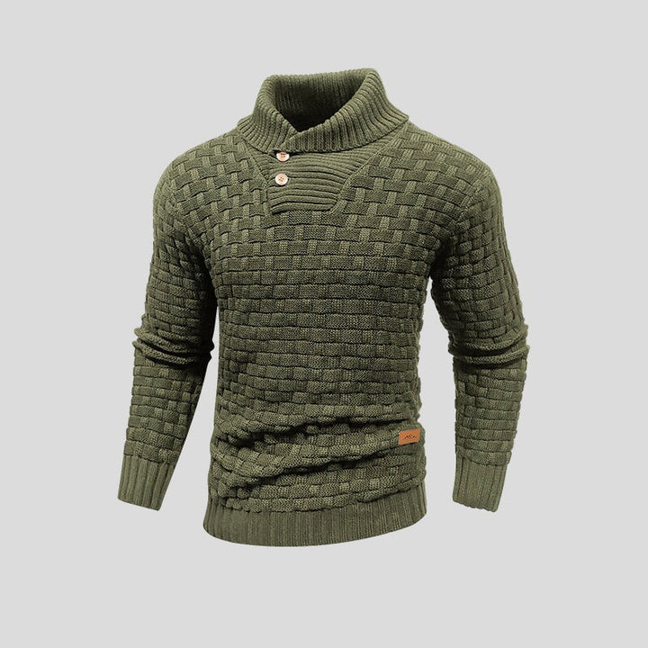Detailopname van de zachte gebreide textuur van de heren trui. Comfortabel en warm, perfect voor de koudere dagen.