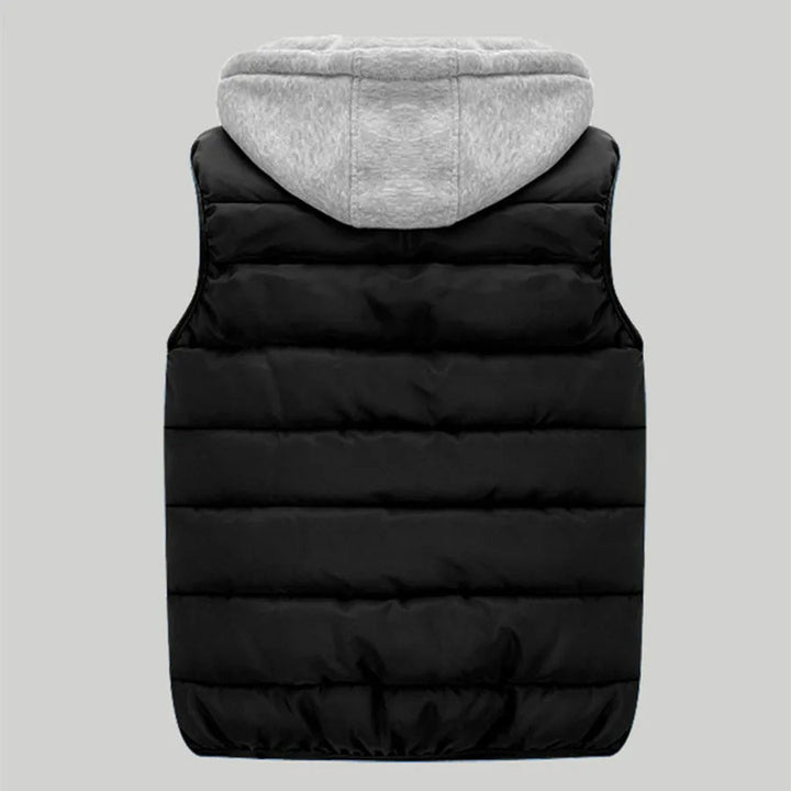 Sportieve heren bodywarmer, gewatteerd met capuchon, perfect voor buitenactiviteiten in lente/herfst.