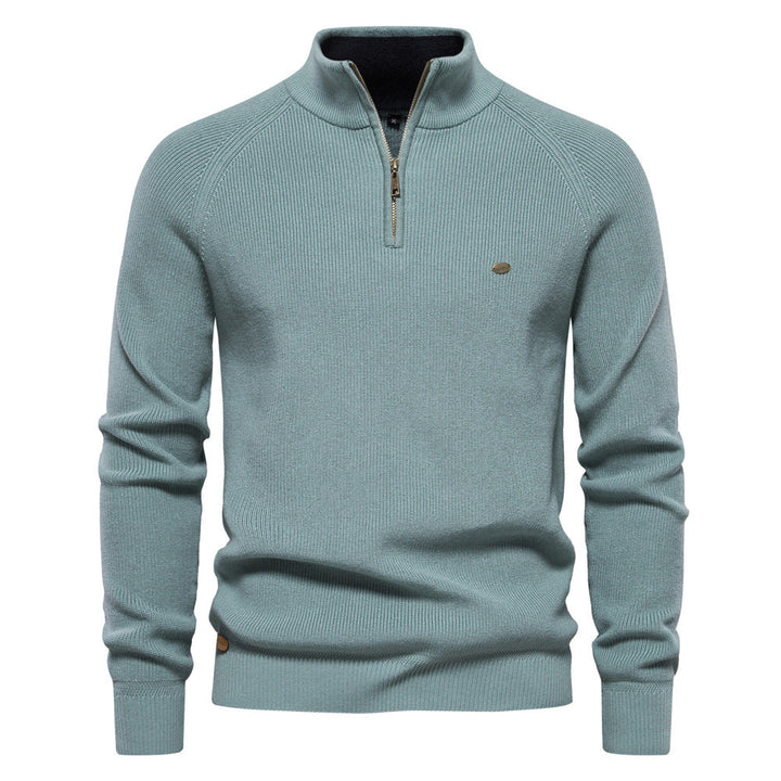 Blauwe heren half-zip trui, ademend & warm. Stijlvolle keuze voor comfort & veelzijdigheid.