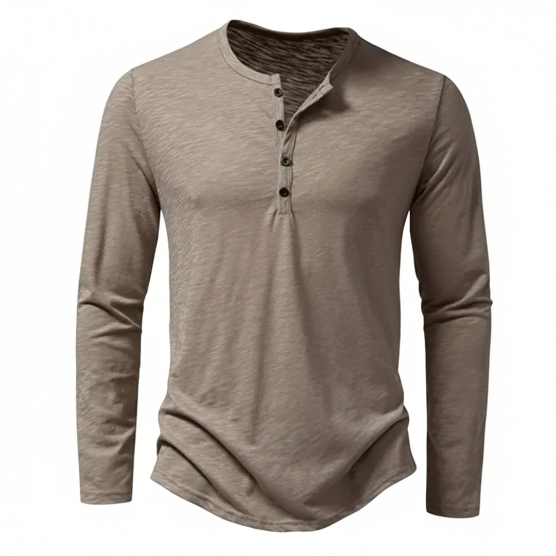 Heren henleyshirt met lange mouw en knoopsluiting, ideaal voor een casual, comfortabele look.