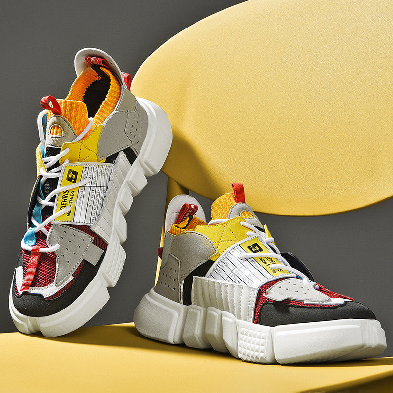Zwarte en grijze heren sneakers met een trendy chunky platformzool.