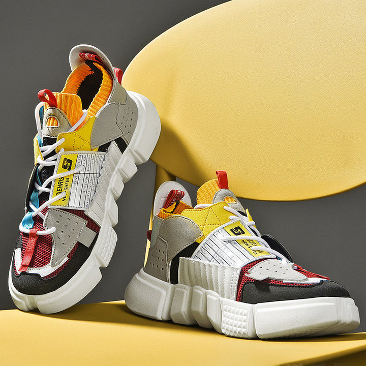 Zwarte en grijze heren sneakers met een trendy chunky platformzool.