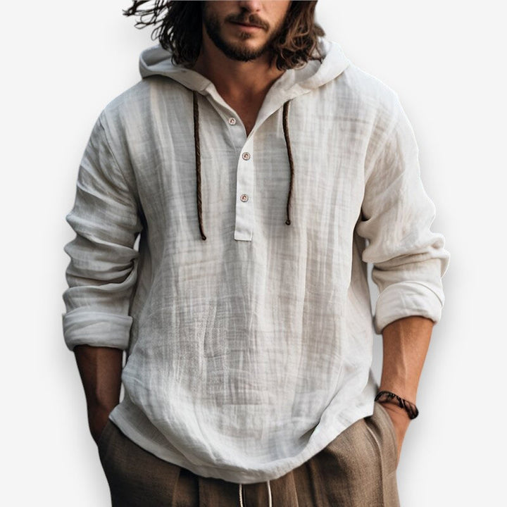 Heren hoodie met relaxte pasvorm, capuchon en trendy knoopsluiting. Ideaal voor casual look.