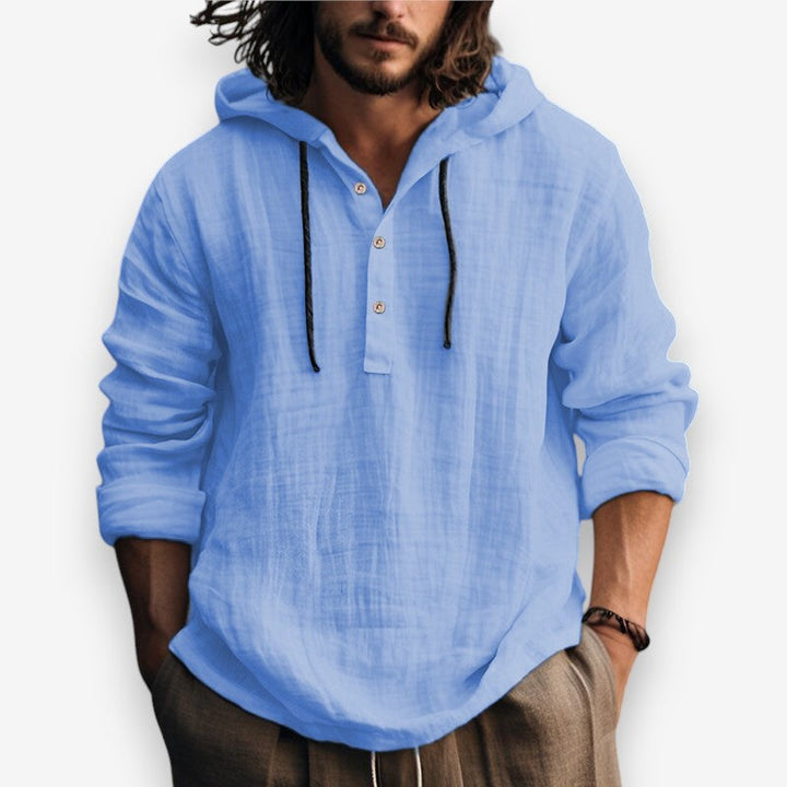 Heren hoodie met opvallende knoopsluiting en comfortabele capuchon. Relaxte pasvorm, perfect voor herenmode.