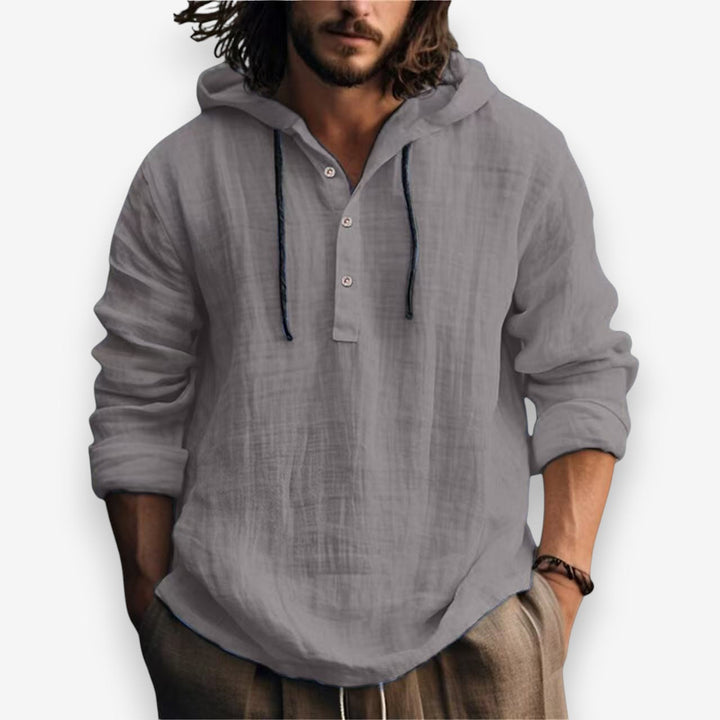 Casual heren hoodie met knoopsluiting, grote capuchon en relaxte pasvorm voor ultiem comfort.