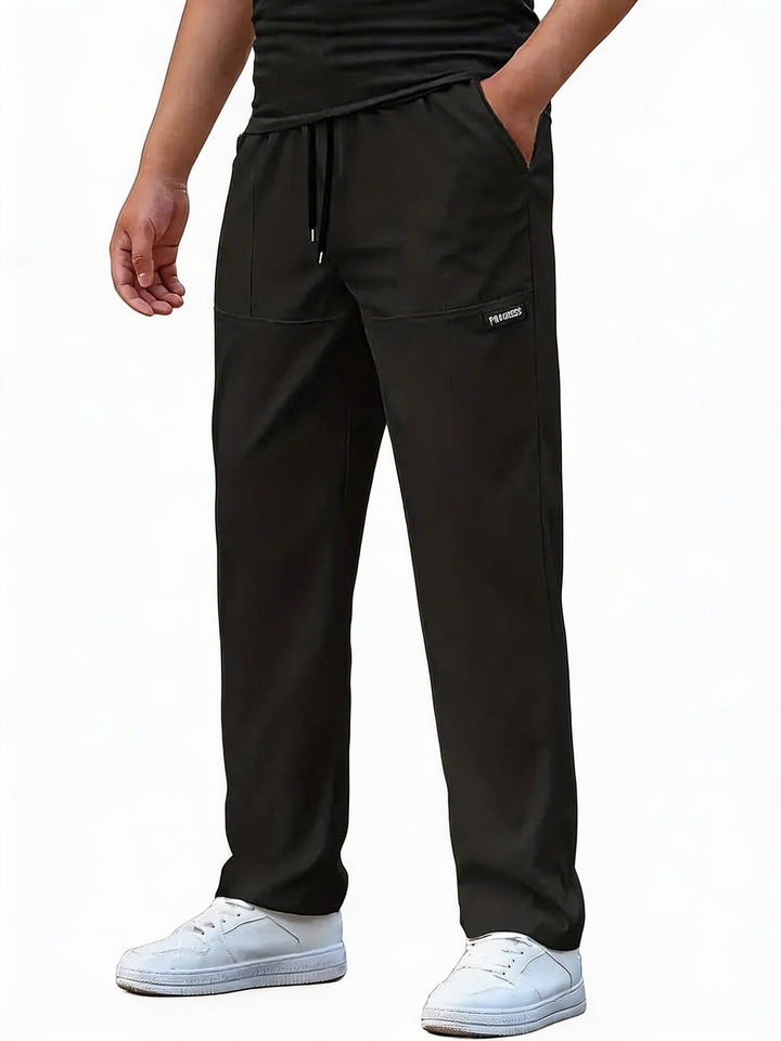 Heren joggingbroek grijs met elastische taille en trekkoord, ideaal voor comfortabele casual kleding of sport.