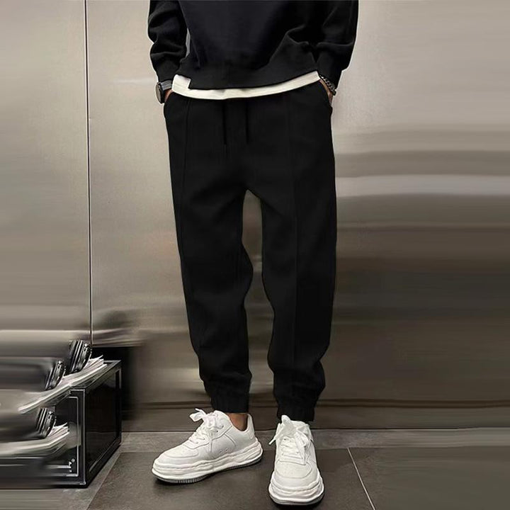 Heren sportbroek, ideaal voor fitness of als comfortabele vrijetijdsbroek. Met praktische achterzakken.