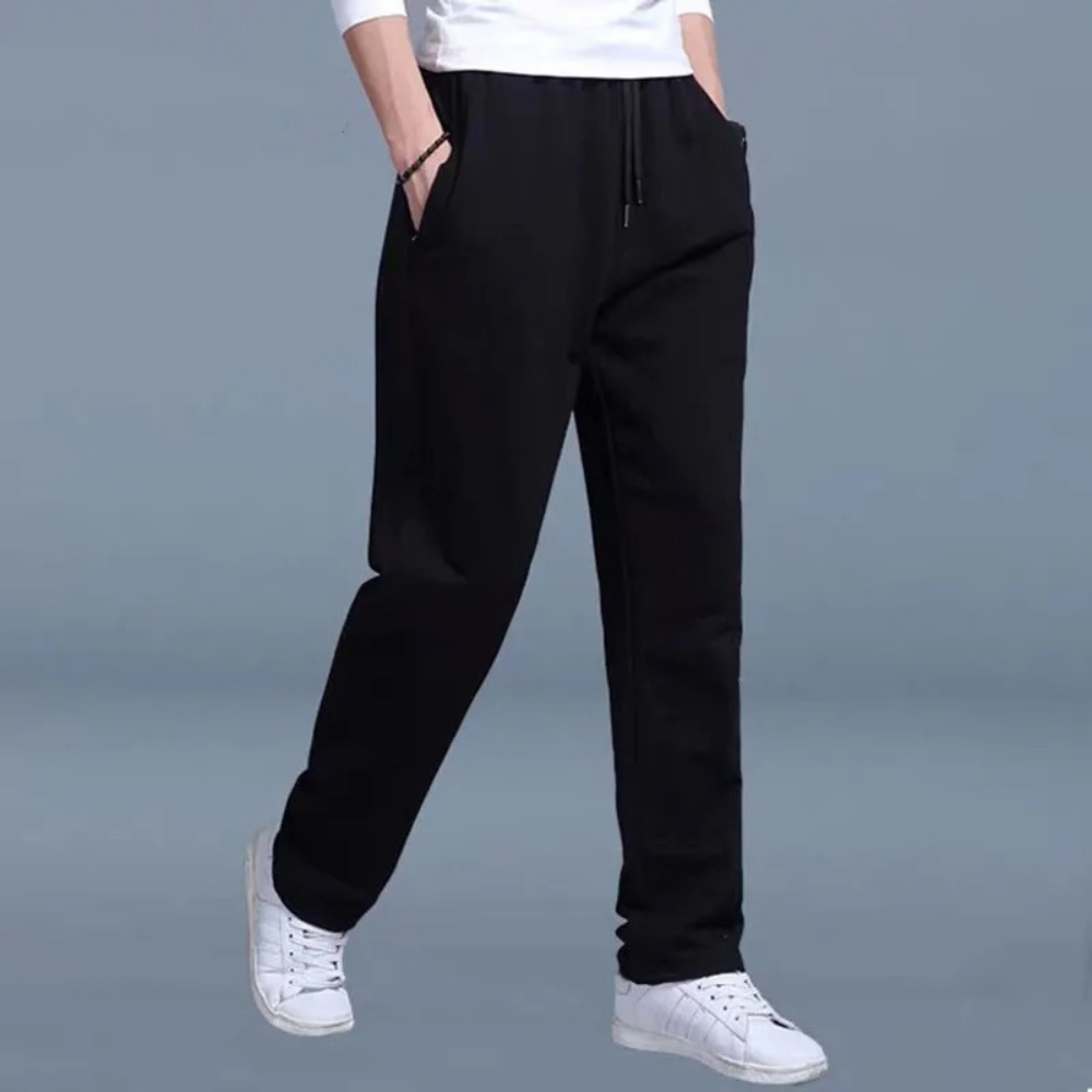 Mannen joggingbroek met ruime pijpen, ademend katoen voor maximale bewegingsvrijheid.