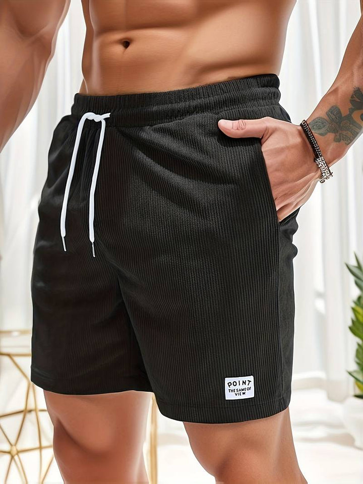 Heren korte broek van zachte ribstof, casual zomerstijl, elastische tailleband, zijzakken, eigentijdse look.