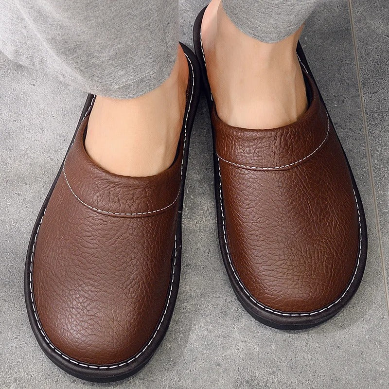 Heren leren pantoffels van hoogwaardig leder met zachte voering en duurzame zool, stijlvol ergonomisch ontwerp voor comfort.