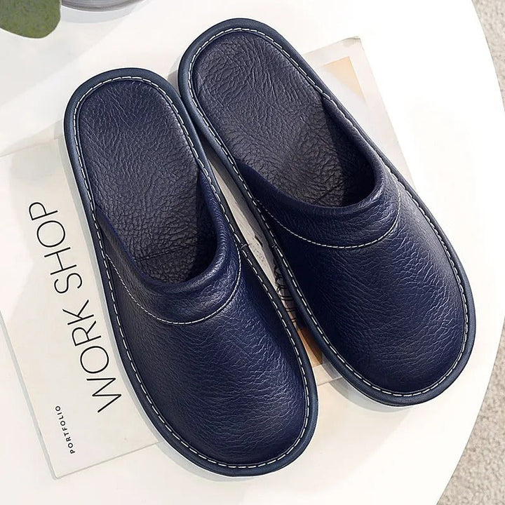 Heren leren pantoffels van hoogwaardig leder met zachte voering en duurzame zool, stijlvol ergonomisch ontwerp voor comfort.