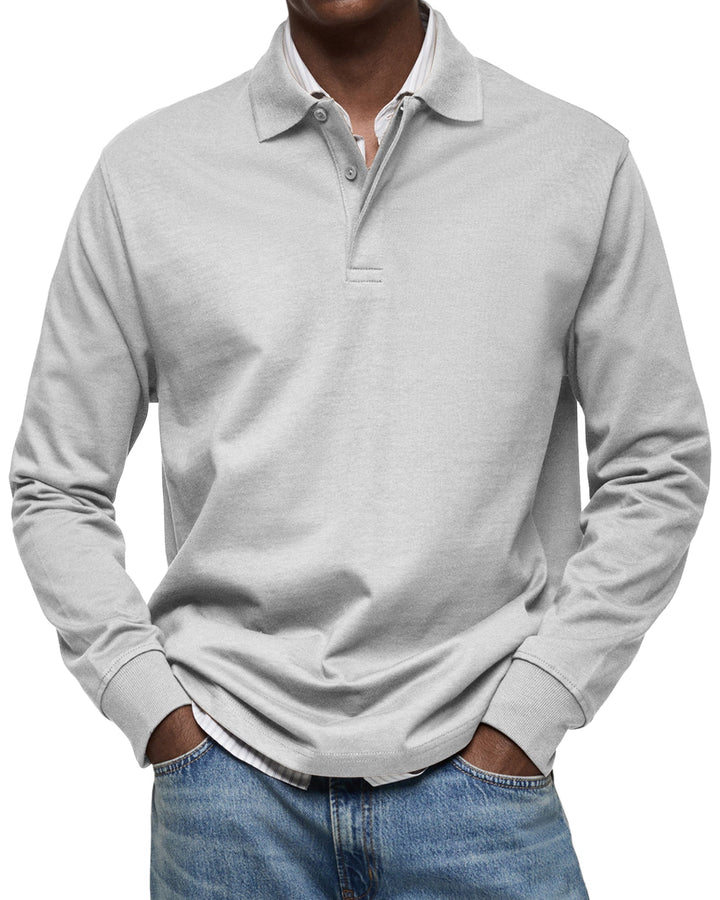 Basic heren polo met lange mouwen, veelzijdig en essentieel voor elke garderobe. Stijlvol en dagelijks.