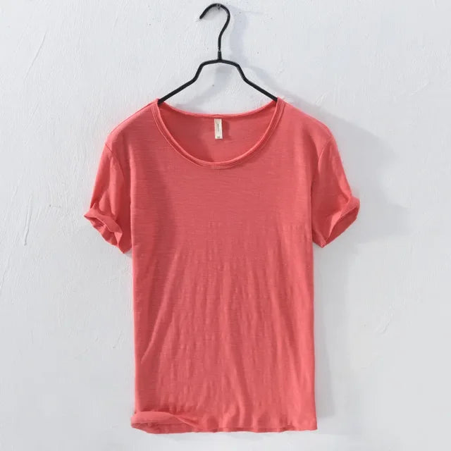 Herenbovenkleding: slim-fit retro T-shirt met O-hals en ruwe rand. Comfortabel voor casual zomerdagen.