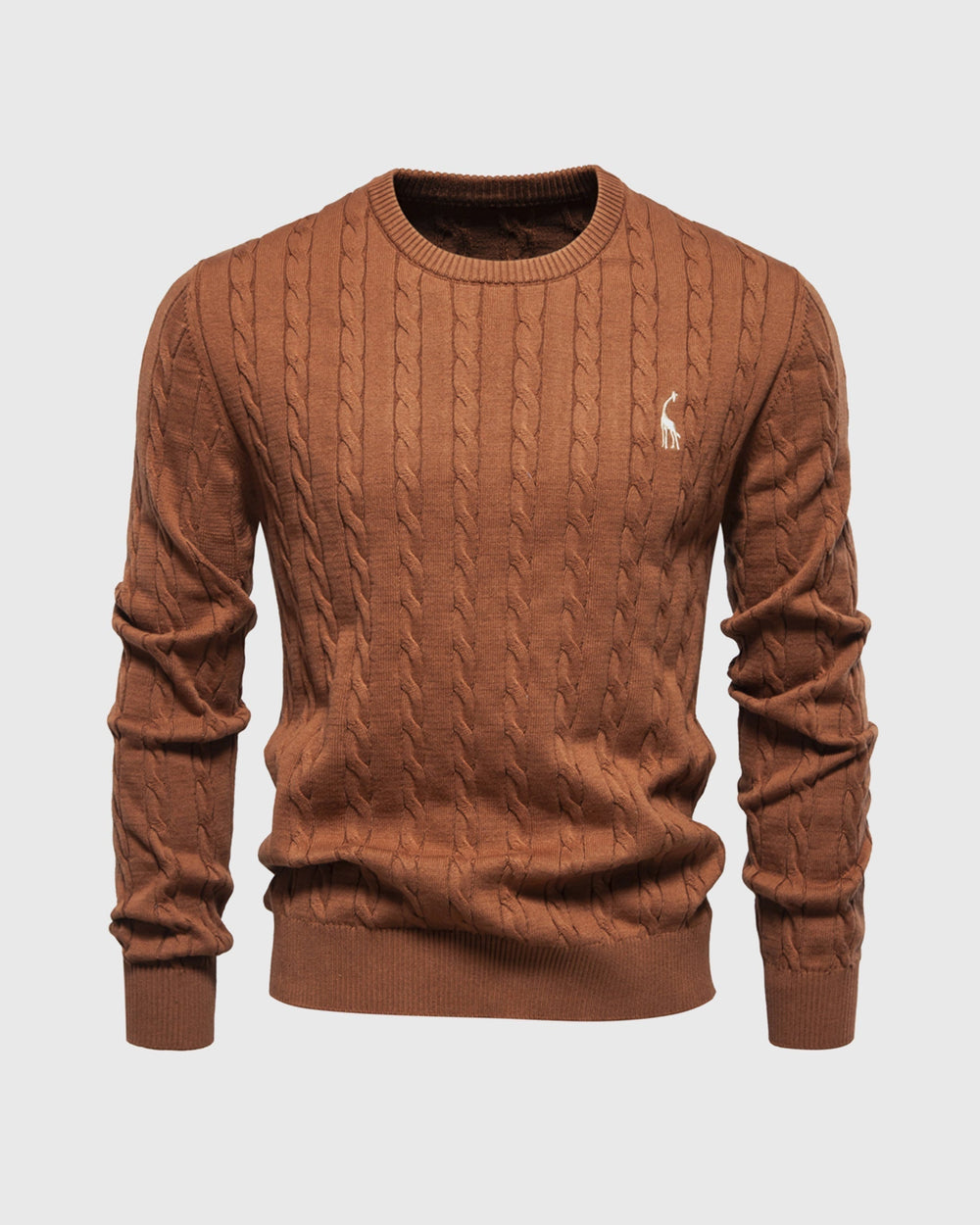 Close-up van het ribgebreide patroon van deze comfortabele heren trui, ideaal voor lente of herfst.