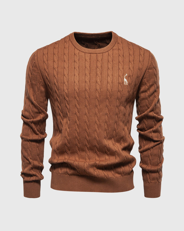 Close-up van het ribgebreide patroon van deze comfortabele heren trui, ideaal voor lente of herfst.