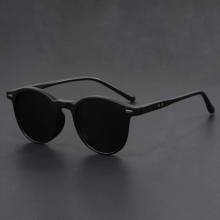 Stijlvolle heren ronde zonnebril, retro design met UV bescherming. Perfect voor een casual of festival look en streetstyle.