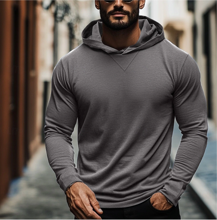 Comfortabele heren slim fit hoodie, ideaal voor sportieve look en herfst/winter met kangoeroezak.
