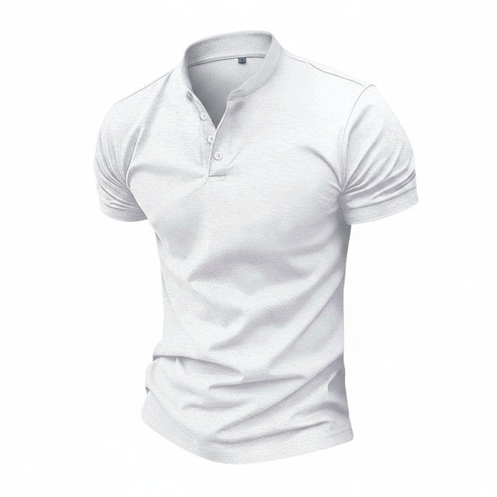 Heren slim fit polo met korte mouwen, staande kraag en knoopsluiting. Ideaal voor smart casual herenmode.