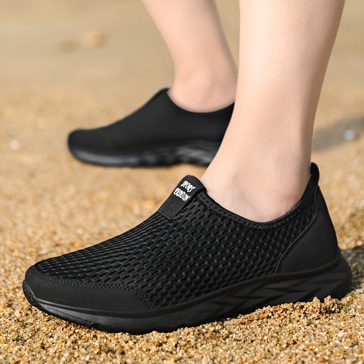"Heren slip-on sneakers met ademend mesh en EVA-zool, ideaal voor wandelen en dagelijks comfort, zonder veters."