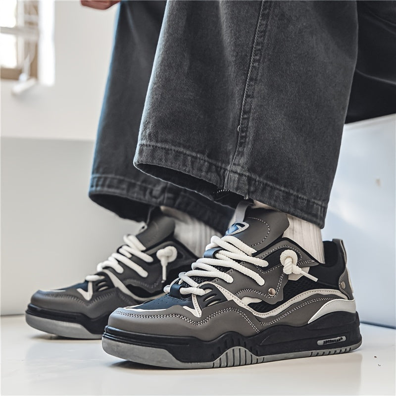 Sportieve herensneakers met dynamisch patroon, bieden ademend comfort en een trendy uitstraling.