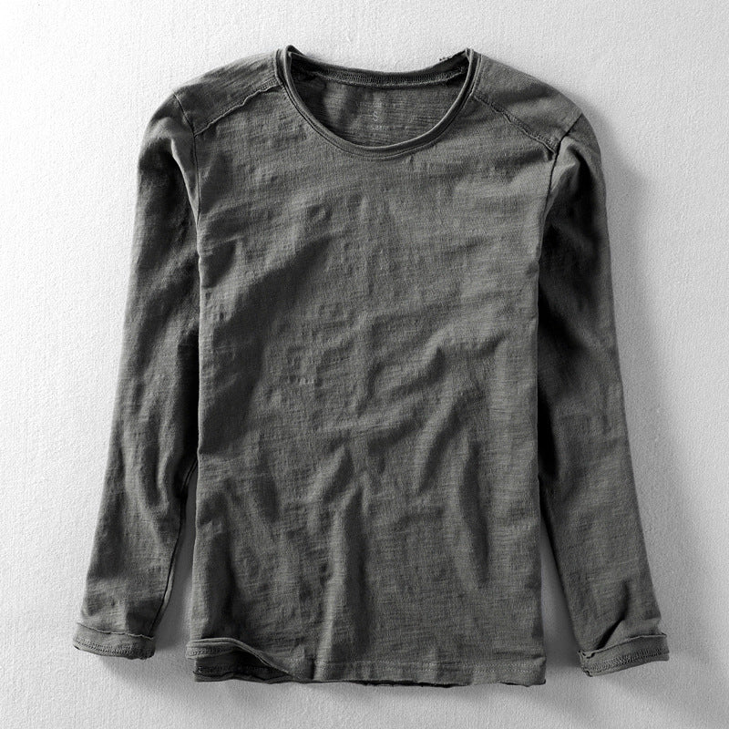 Tijdloos heren T-shirt lange mouw met comfortabele vintage fit en klassieke ronde hals. Essentieel basic shirt.