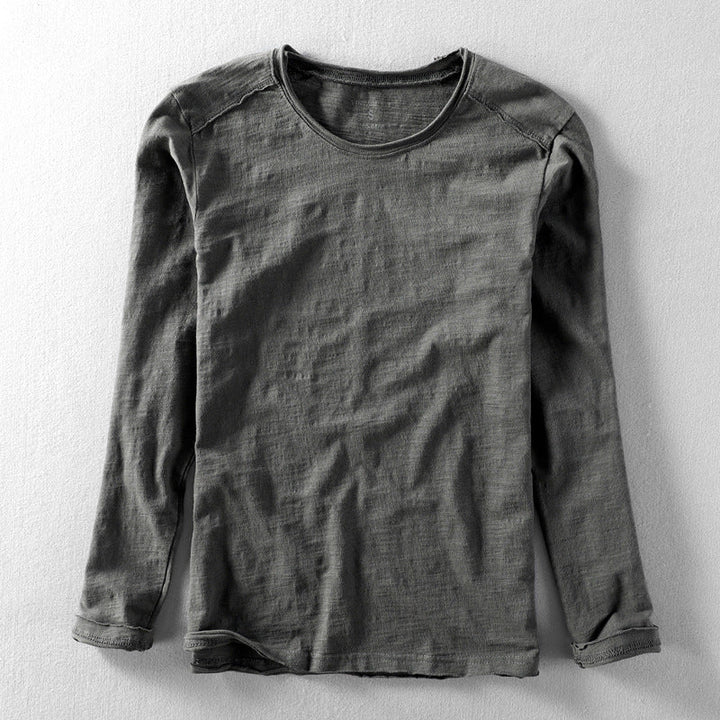 Tijdloos heren T-shirt lange mouw met comfortabele vintage fit en klassieke ronde hals. Essentieel basic shirt.