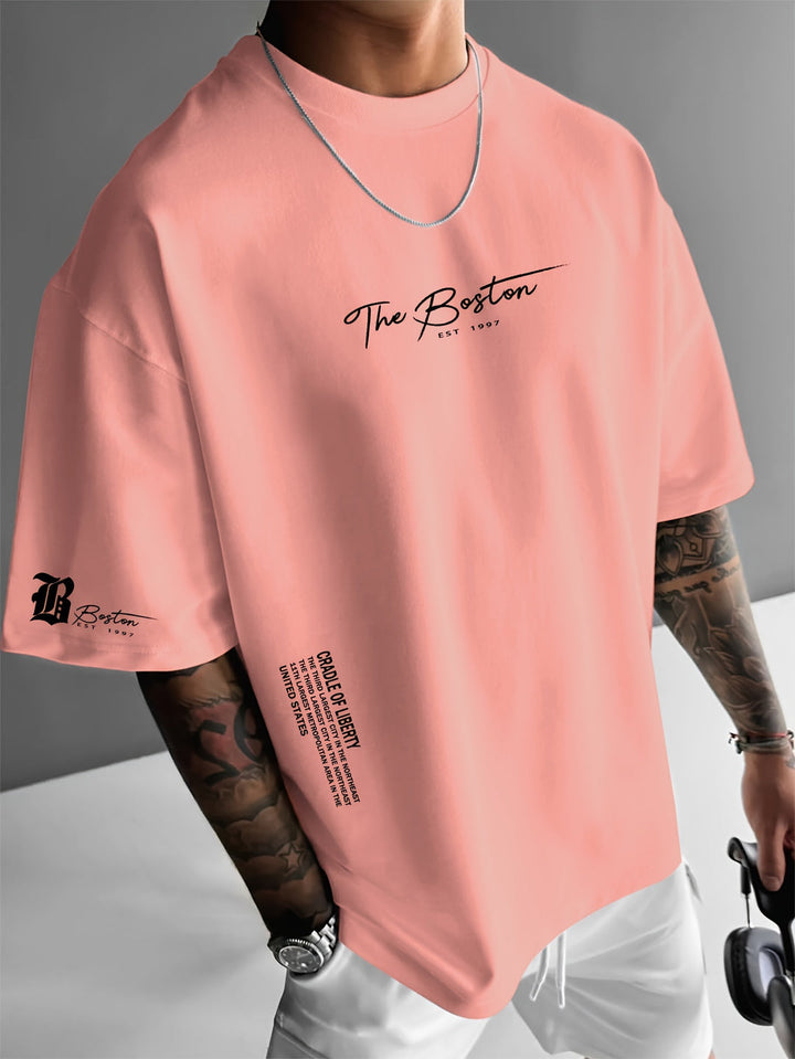 Trendsettend heren t-shirt met slogan en comfortabele loose fit. Perfect voor streetwear en zomerse dagen.