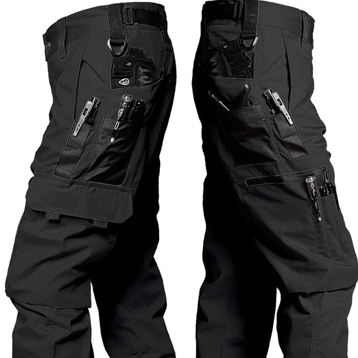 Robuuste, waterdichte heren werkbroek van duurzaam polyester, perfect voor outdoor en zware werkomstandigheden.