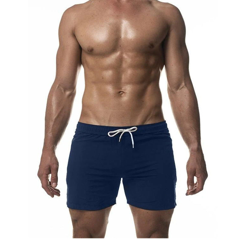 "Heren trainingszwemshort, lichtgewicht sneldrogende stof, elastische tailleband, strak sportief ontwerp, zijzakken"