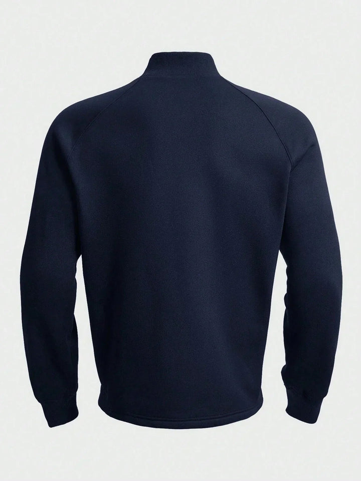 Heren trui: zachte stof, halve rits en opstaande kraag, essentieel voor casual herenmode.