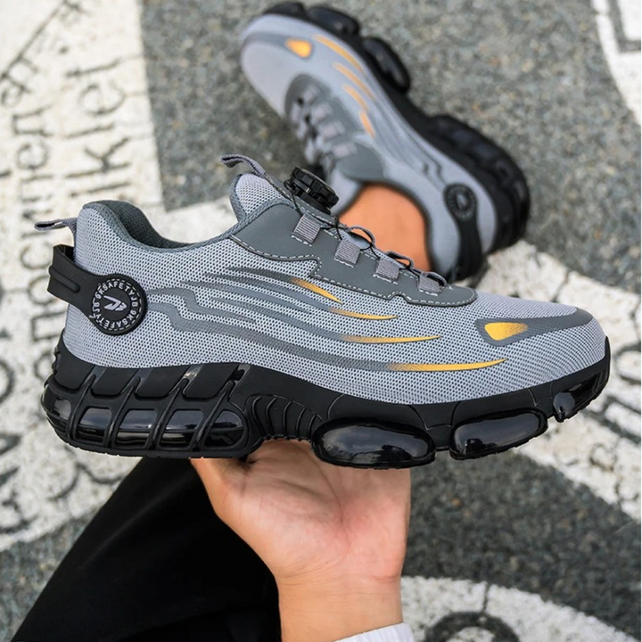 Antislipzool van duurzame heren werkschoenen, grijs/zwart, voor extra grip en veiligheid op de werkvloer.