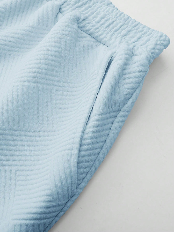 Functionele heren zomerset: comfortabel korte mouw shirt en sportieve shorts. Ideaal voor actieve vrijetijd.