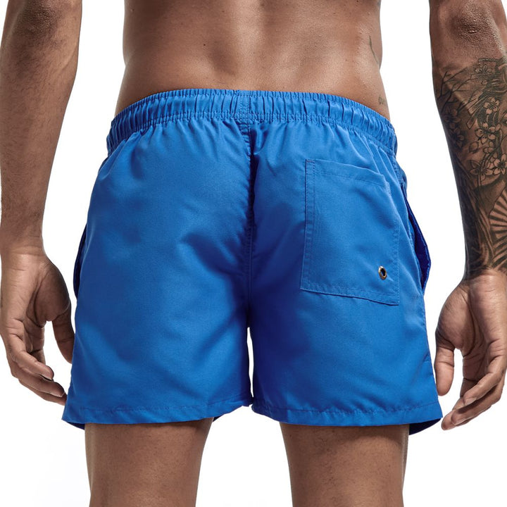Zomerse heren zwemshort met trekkoord en zijzakken, perfect voor zwemmen, relaxen op het strand of vakantie.